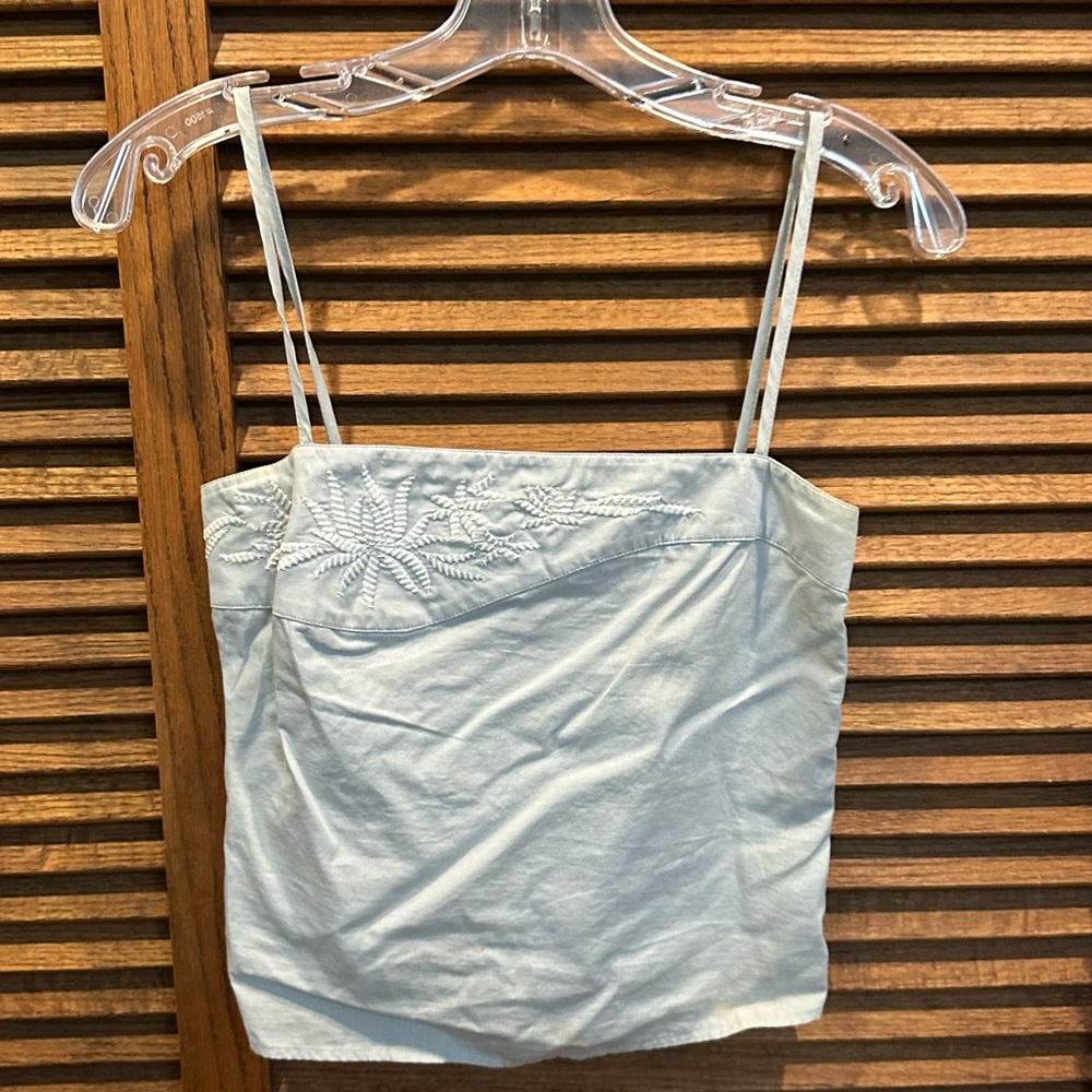 Gently used camisole top with embroidered floral pattern. size 36